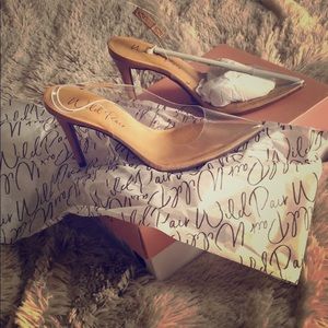 Pointy clear/nude color heels